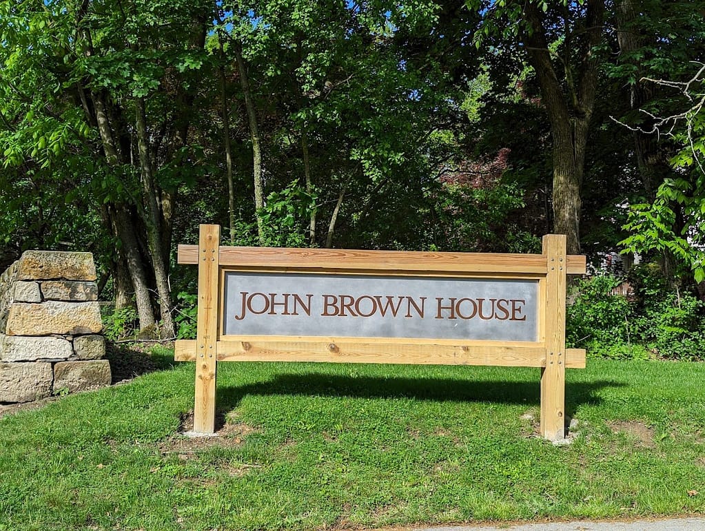 Custom metal sign for the John Brown House